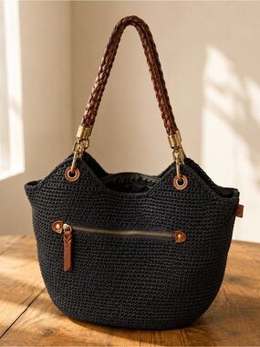 The Sak Indigo Crochet Shoulder Bag with Braided Cognac Leather Straps
